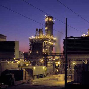 PHOTO D'USINE AU COUCHE DU SOLEIL